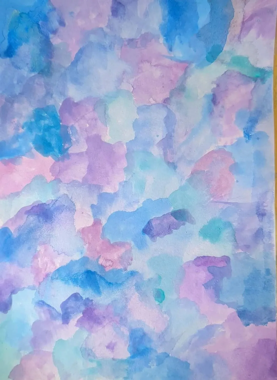 A painting of blue and purple clouds in the sky.