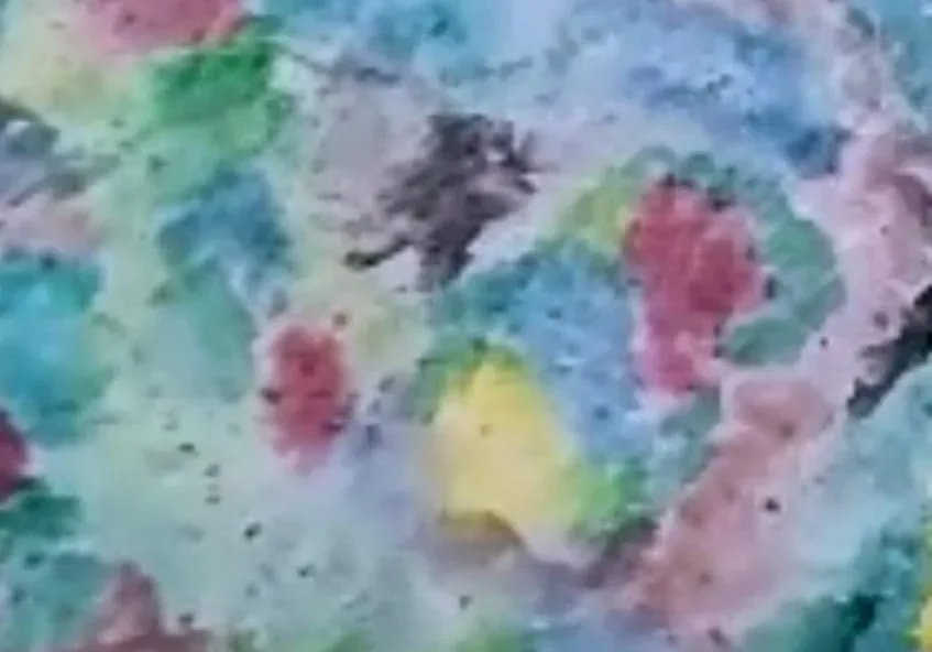 A close up of the colorful painting